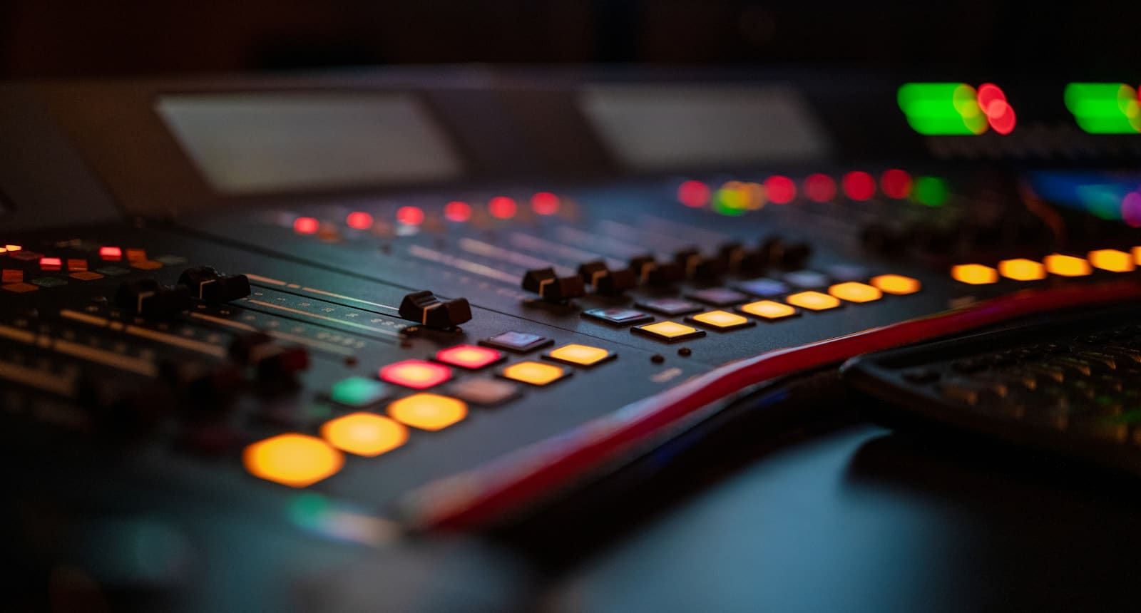A vintage audio mixer with sliders and knobs, evoking custom soundscape design